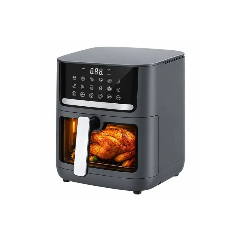 Transparent viewing window showing food cooking inside fryer Transparent viewing window showing food cooking inside fryer