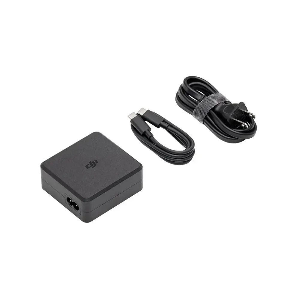 DJI 100W charger adapter showing power input details