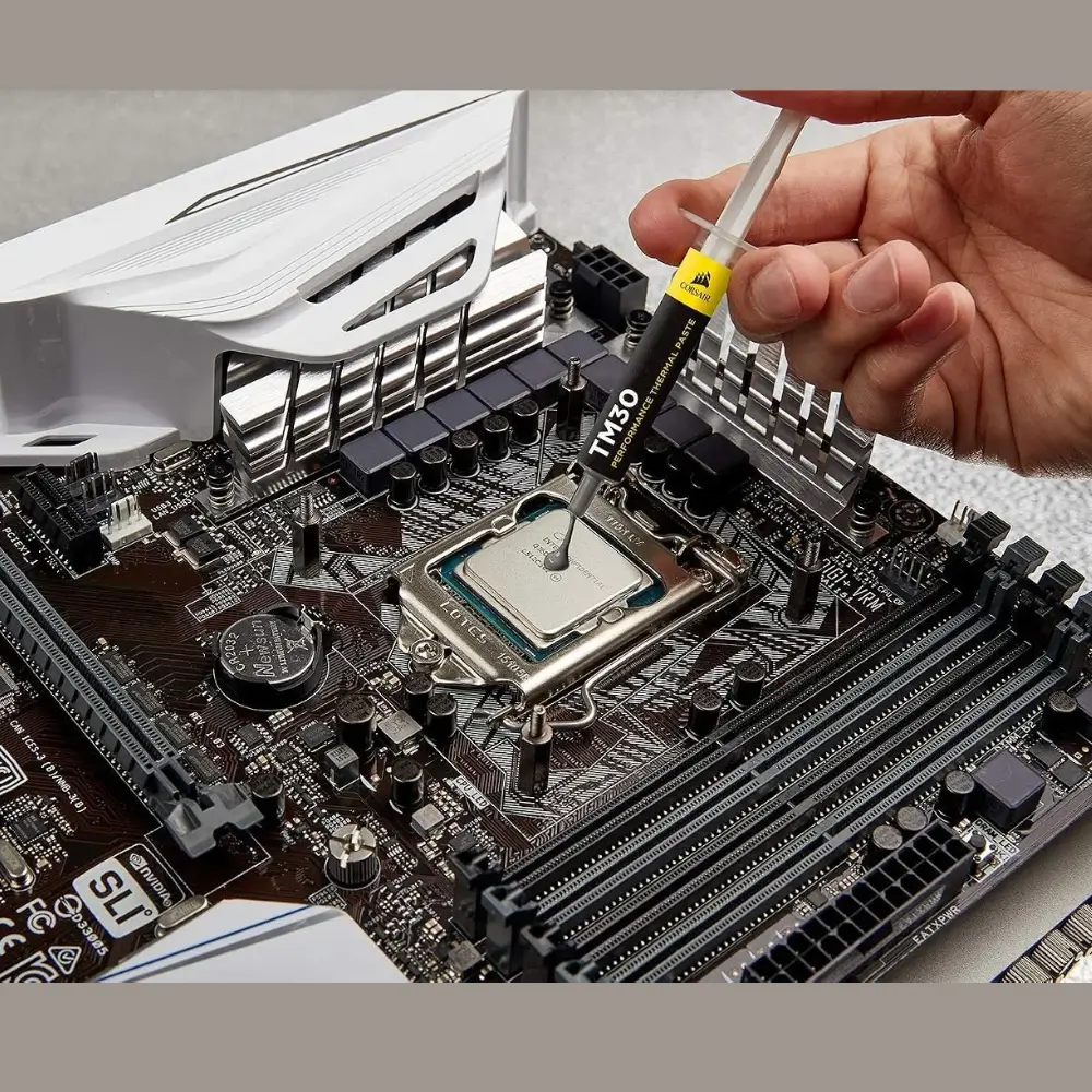 Close-up of the Corsair TM30 thermal paste syringe tip