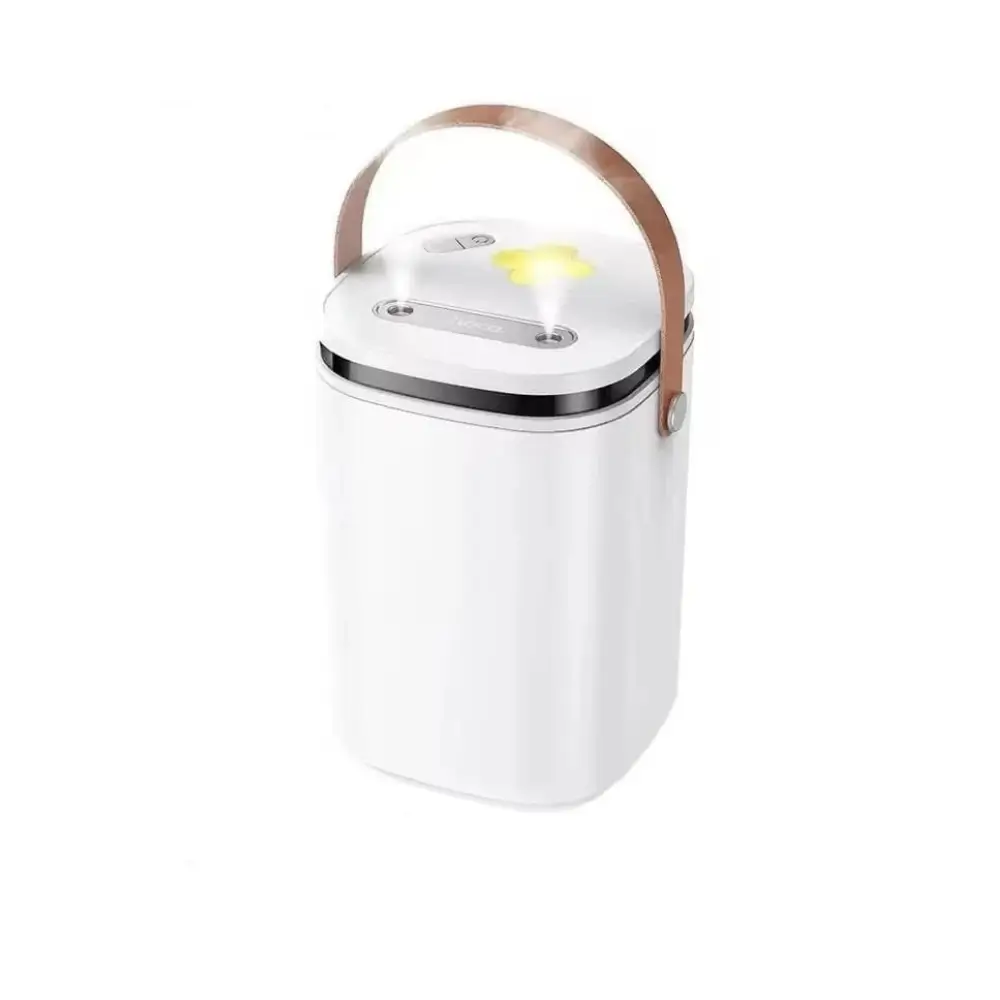 HOCO HX35 quiet humidifier placed on a bedside table in a bedroom HOCO HX35 quiet humidifier placed on a bedside table in a bedroom
