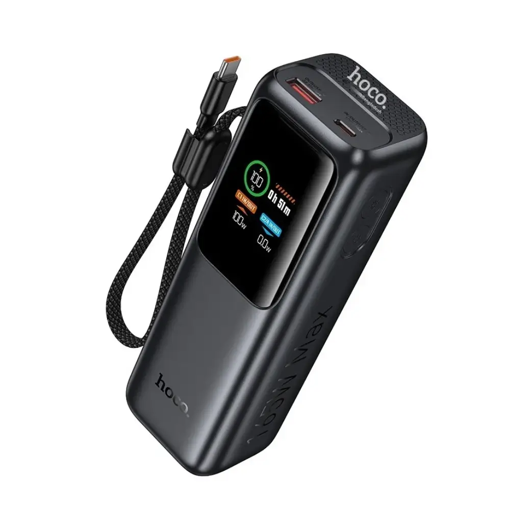 Hoco Q57 Falcon power bank charging a laptop and phone on a desk