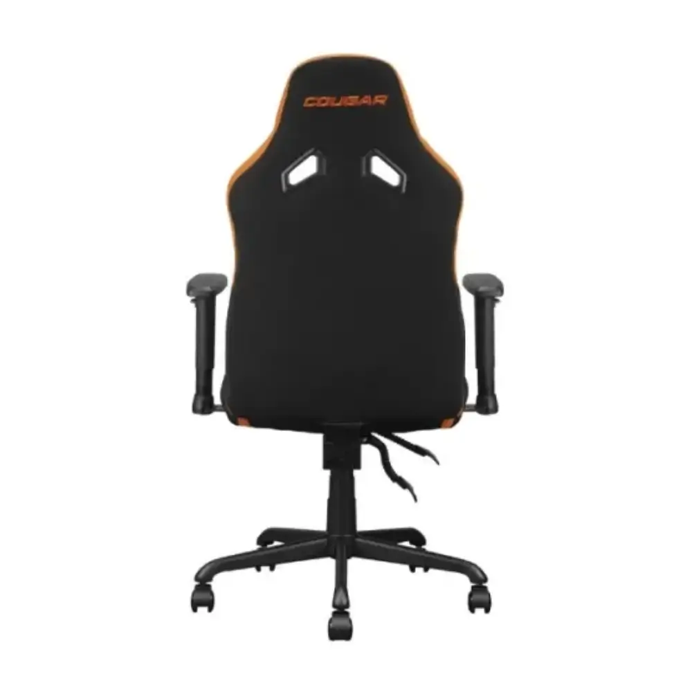 Gamer seated in the Cougar Fusion SF gaming chair at a desk setup Gamer seated in the Cougar Fusion SF gaming chair at a desk setup